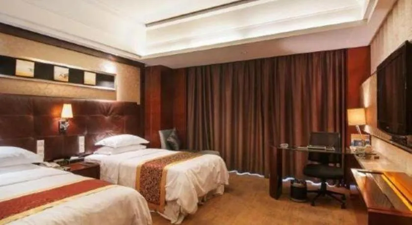 Bed in Maison New Century Hotel Wuyuan Haiyan