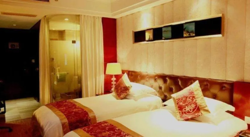 Bed in Maison New Century Hotel Wuyuan Haiyan