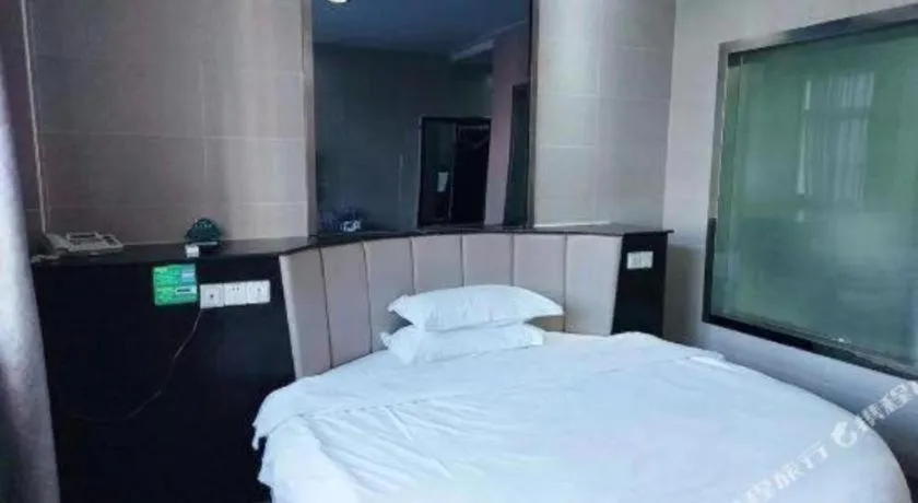 Bed in GreenTree Inn Huaian Lianshui Jindi International Garden Business Hotel
