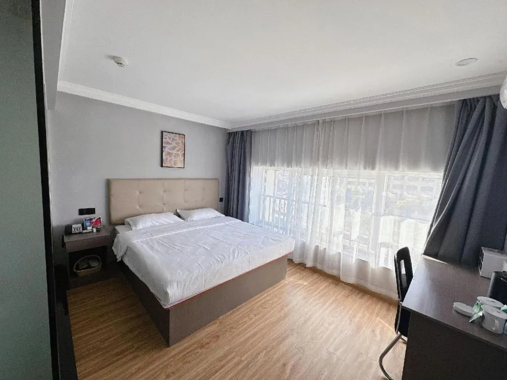 Bed in GreenTree Inn Huaian Lianshui Jindi International Garden Business Hotel