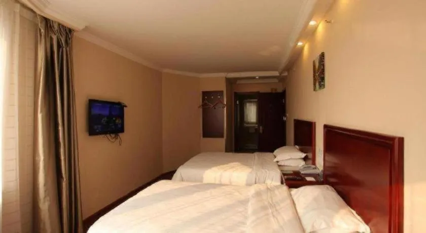 Bed in GreenTree Inn Huaian Lianshui Jindi International Garden Business Hotel
