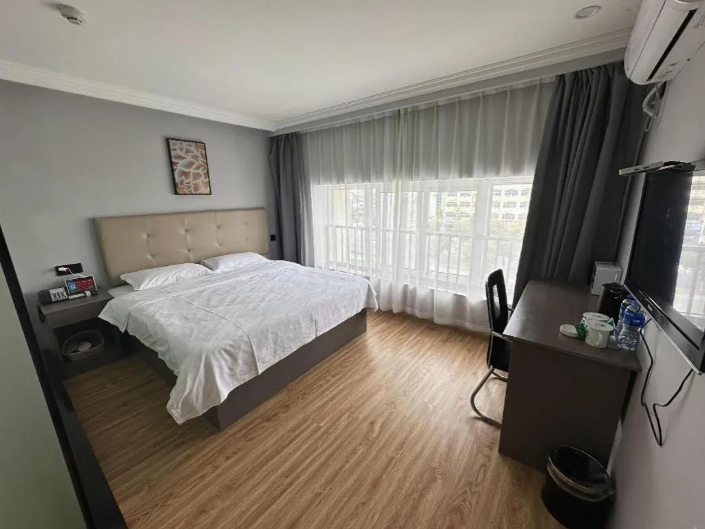 Bed in GreenTree Inn Huaian Lianshui Jindi International Garden Business Hotel