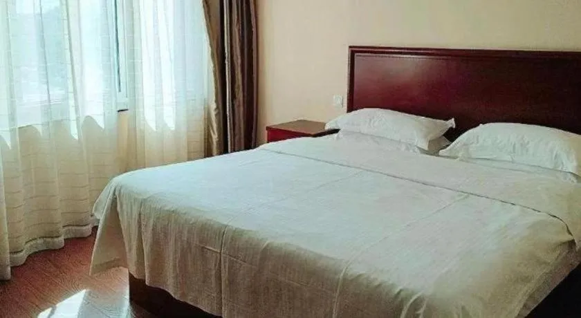 Bed in GreenTree Inn Huaian Lianshui Jindi International Garden Business Hotel