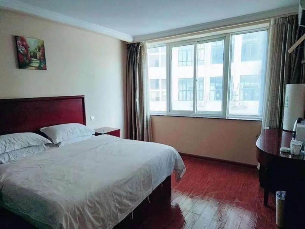 Bed in GreenTree Inn Huaian Lianshui Jindi International Garden Business Hotel
