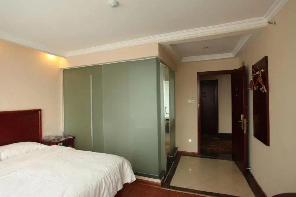 Bed in GreenTree Inn Huaian Lianshui Jindi International Garden Business Hotel