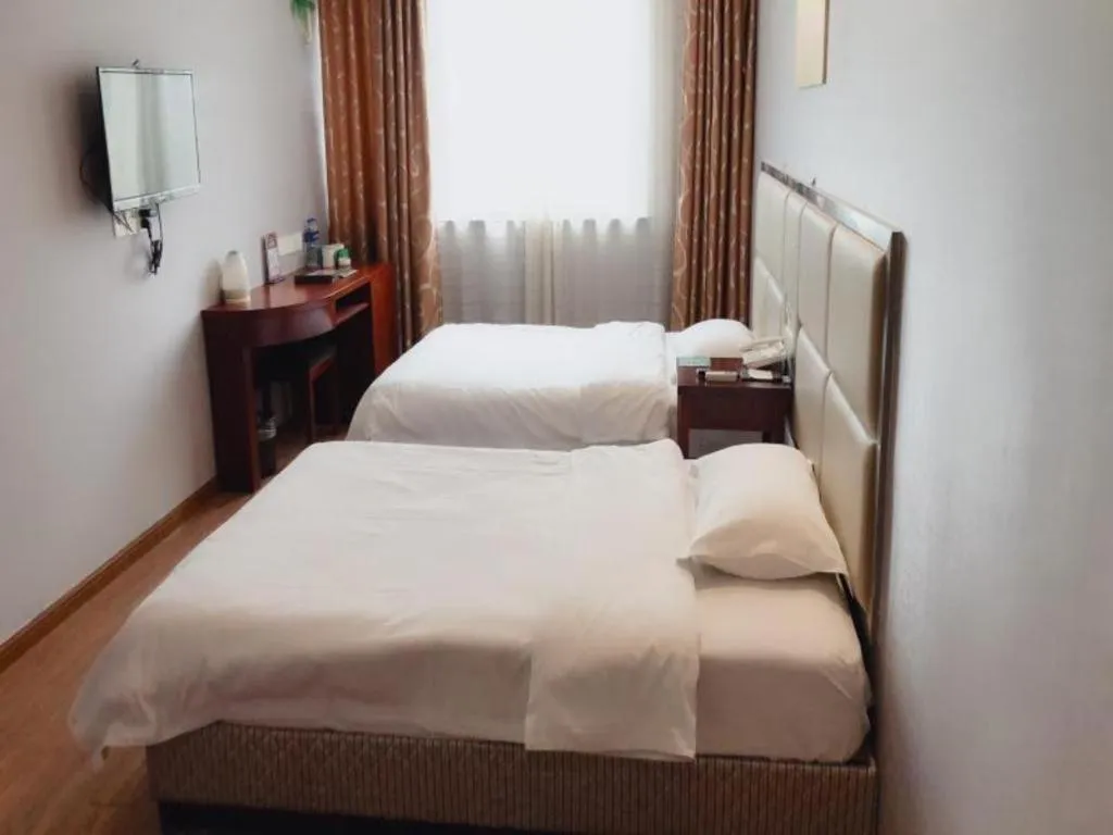 Bed in GreenTree Inn Huaian Lianshui Jindi International Garden Business Hotel