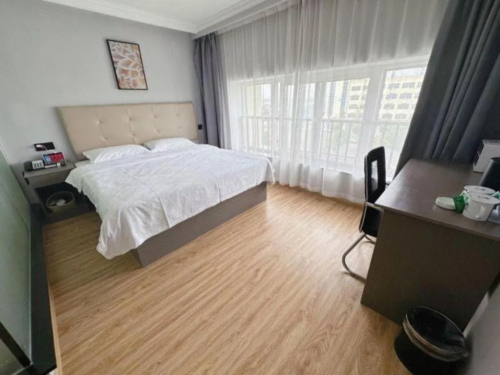 Bed in GreenTree Inn Huaian Lianshui Jindi International Garden Business Hotel