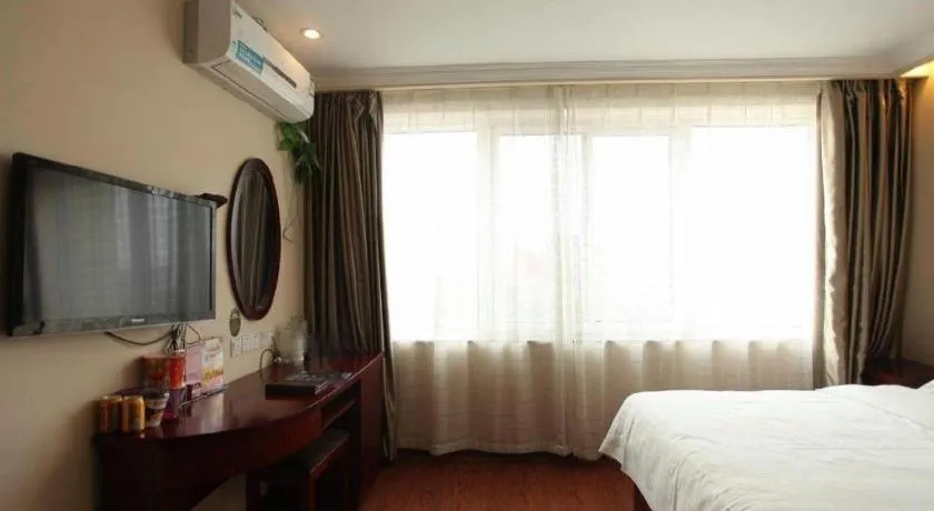 Bed in GreenTree Inn Huaian Lianshui Jindi International Garden Business Hotel