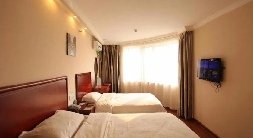 Bed in GreenTree Inn Huaian Lianshui Jindi International Garden Business Hotel