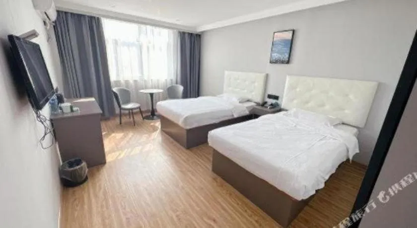 Bed in GreenTree Inn Huaian Lianshui Jindi International Garden Business Hotel