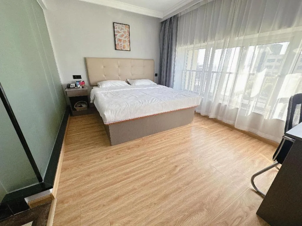 Bed in GreenTree Inn Huaian Lianshui Jindi International Garden Business Hotel