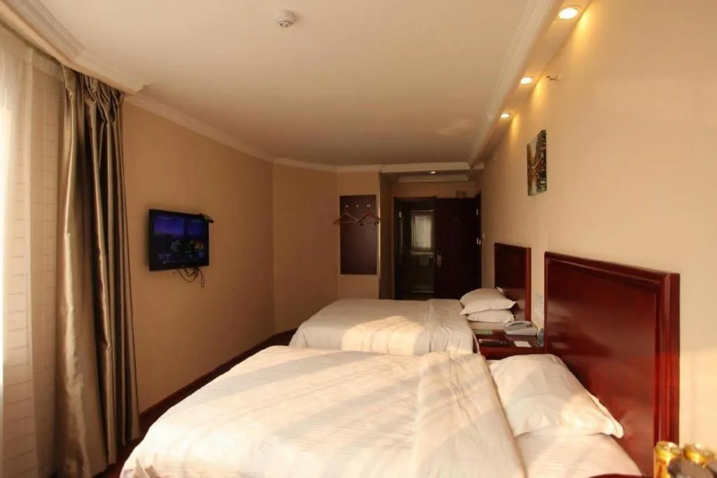 Bed in GreenTree Inn Huaian Lianshui Jindi International Garden Business Hotel