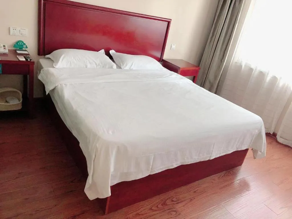 Bed in GreenTree Inn Huaian Lianshui Jindi International Garden Business Hotel