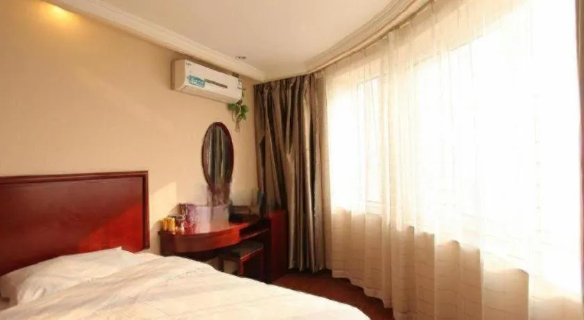Bed in GreenTree Inn Huaian Lianshui Jindi International Garden Business Hotel