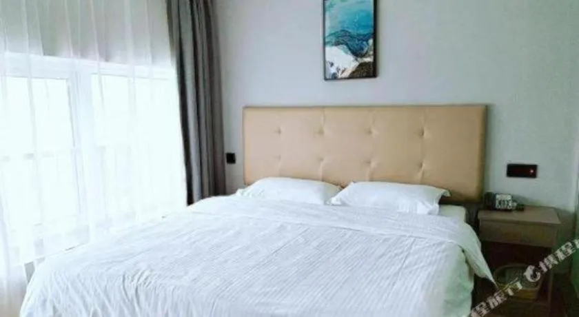 Bed in GreenTree Inn Huaian Lianshui Jindi International Garden Business Hotel