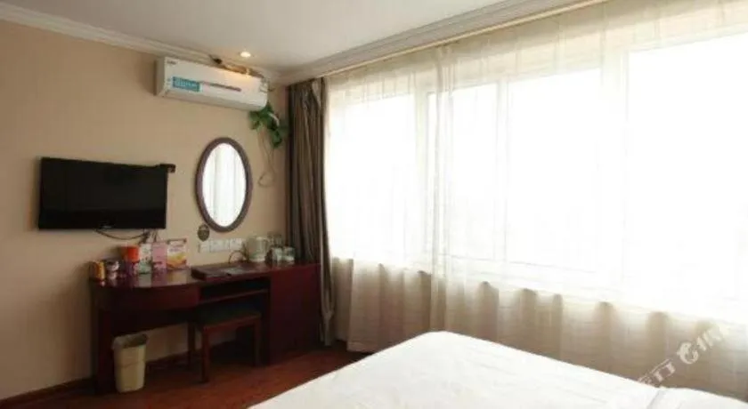 Bed in GreenTree Inn Huaian Lianshui Jindi International Garden Business Hotel
