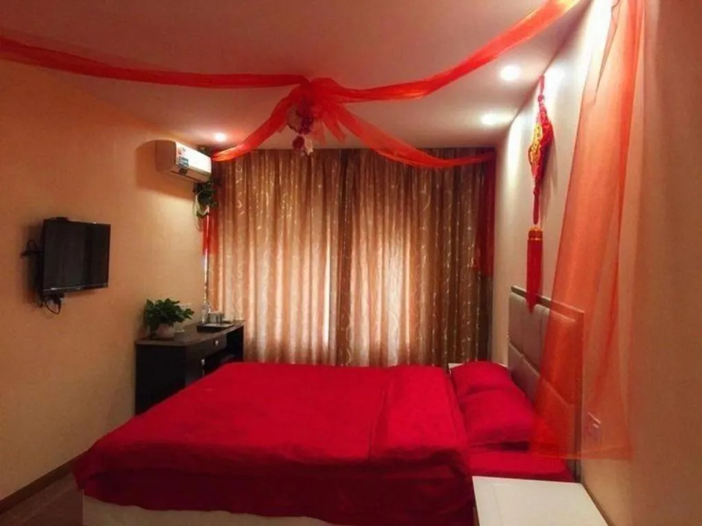 Bed in GreenTree Inn Huaian Lianshui Jindi International Garden Business Hotel