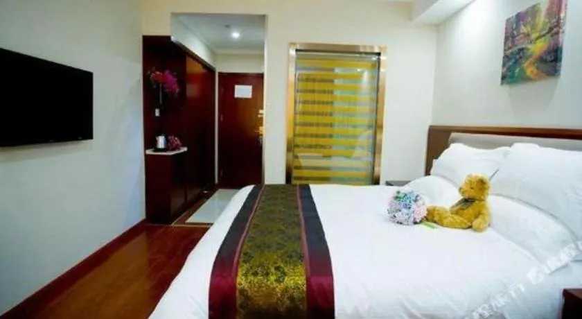 Bed in GreenTree Inn Shanghai South Railway Station Xujiahui Stadium Subway Station Shell Hotel