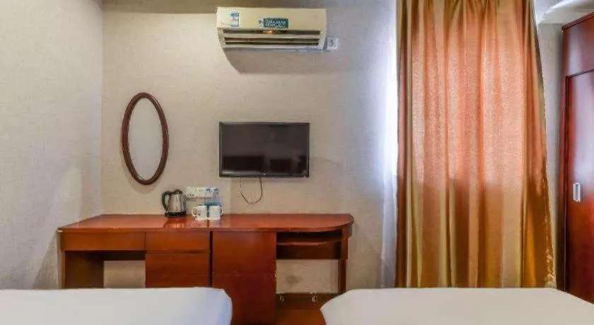 Bed in GreenTree Inn Shanghai South Railway Station Xujiahui Stadium Subway Station Shell Hotel