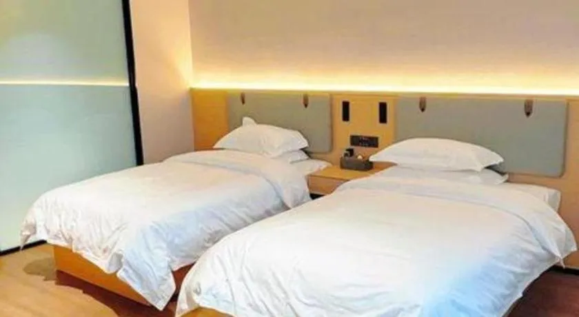Bed in GreenTree Inn Wuxi Changjiang North Road Jincheng Road Express Hotel