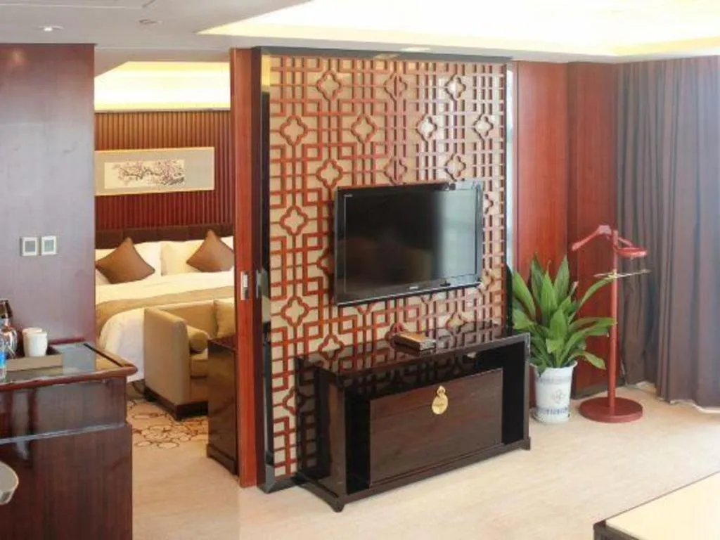 Bed in Zhangjiagang Zhonglian GDH International Hotel