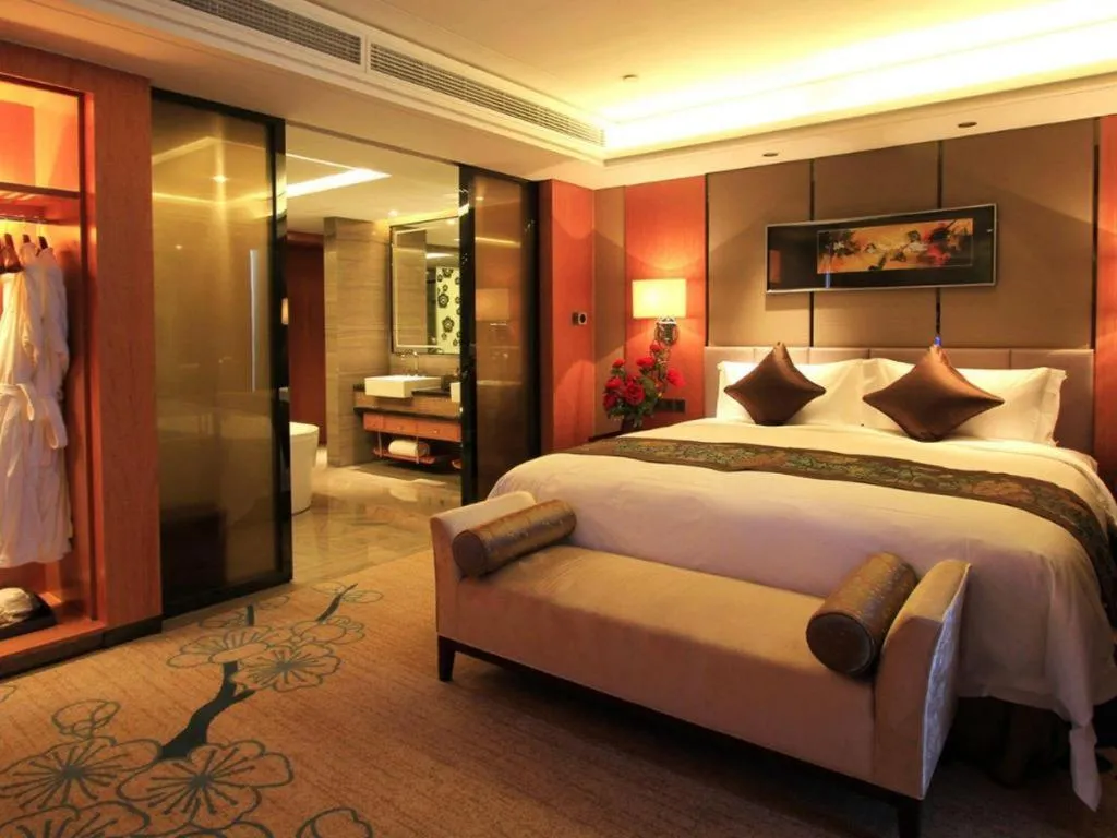 Bed in Zhangjiagang Zhonglian GDH International Hotel