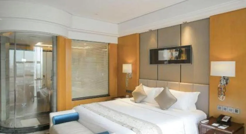 Bed in Zhangjiagang Zhonglian GDH International Hotel