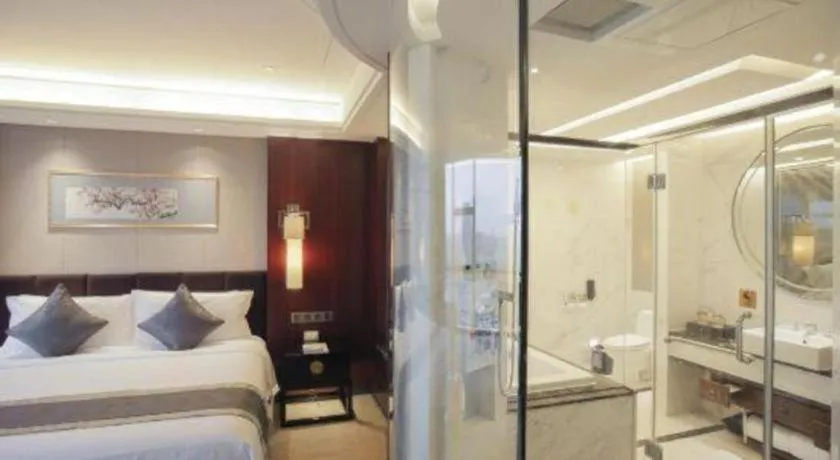 Bed in Zhangjiagang Zhonglian GDH International Hotel