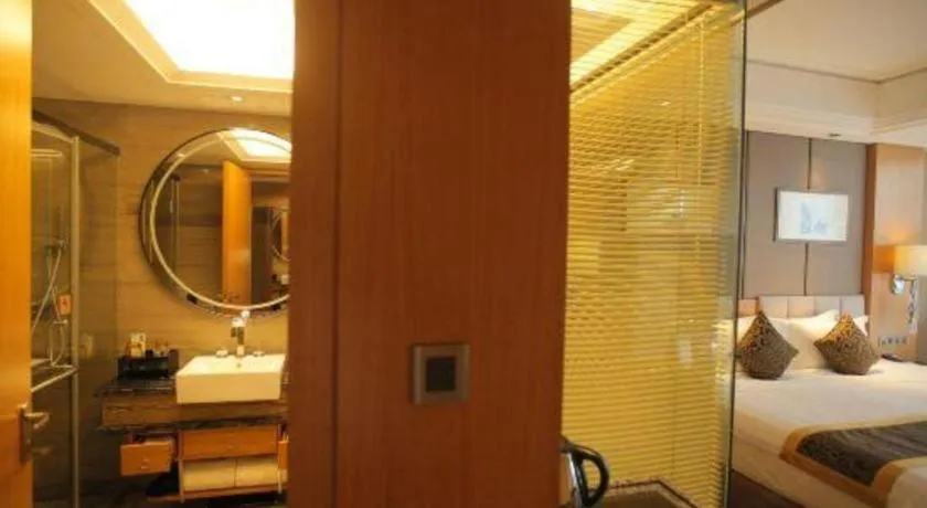 Bed in Zhangjiagang Zhonglian GDH International Hotel