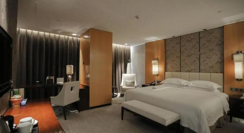 Bed in Zhangjiagang Zhonglian GDH International Hotel