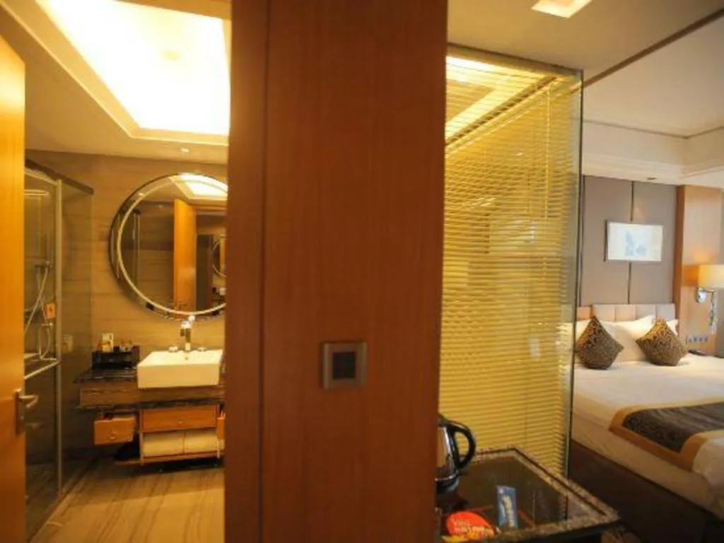 Bed in Zhangjiagang Zhonglian GDH International Hotel