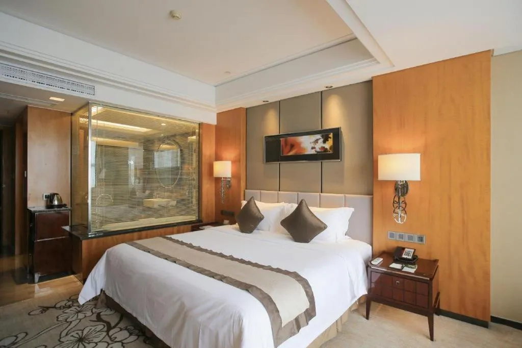 Bed in Zhangjiagang Zhonglian GDH International Hotel