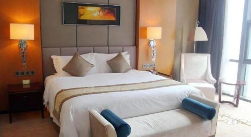 Bed in Zhangjiagang Zhonglian GDH International Hotel