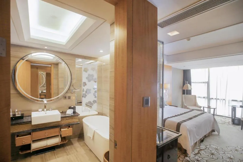 Bed in Zhangjiagang Zhonglian GDH International Hotel