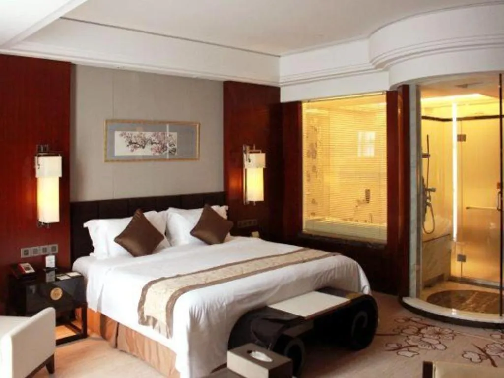 Bed in Zhangjiagang Zhonglian GDH International Hotel