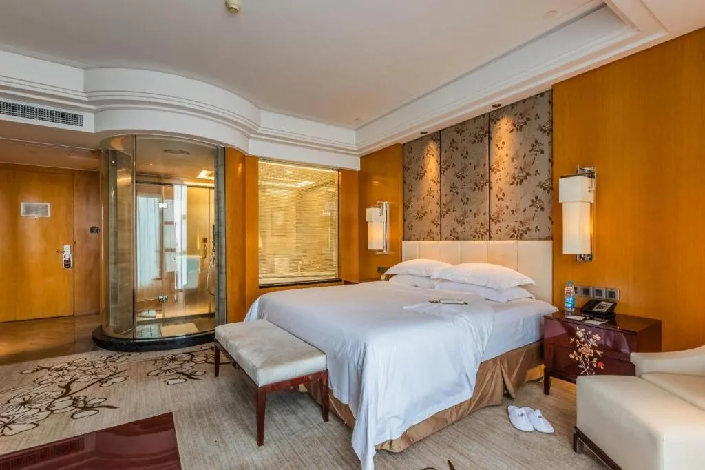 Bed in Zhangjiagang Zhonglian GDH International Hotel