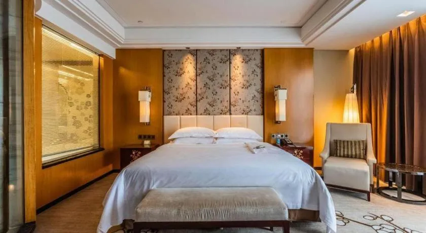 Bed in Zhangjiagang Zhonglian GDH International Hotel