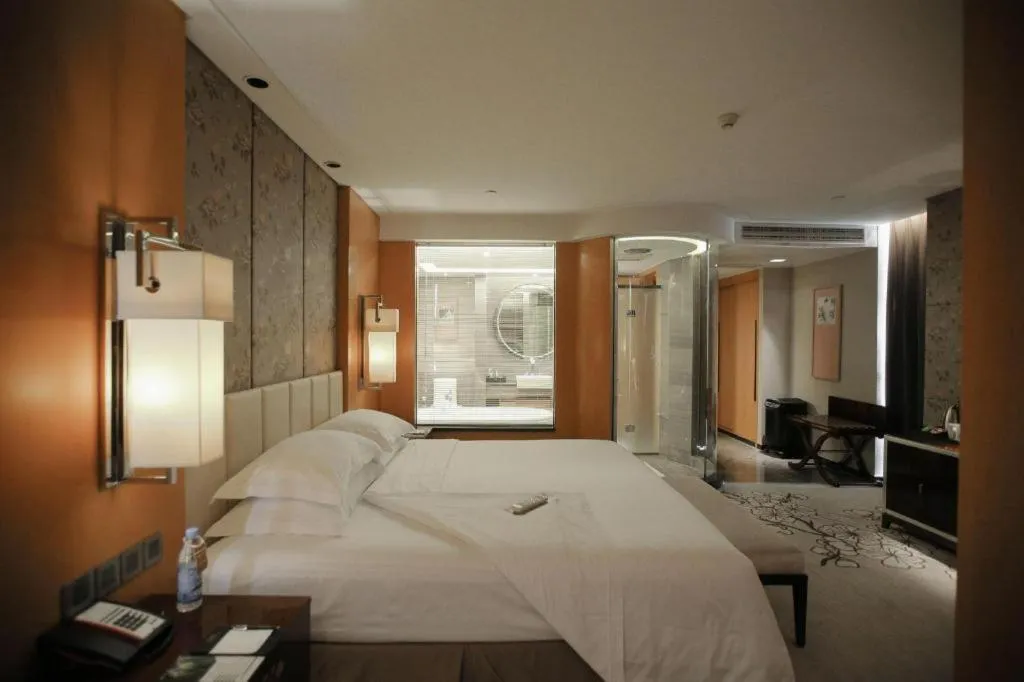 Bed in Zhangjiagang Zhonglian GDH International Hotel