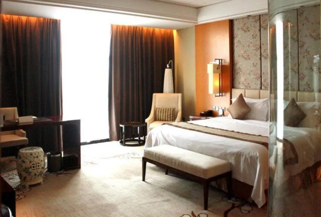 Bed in Zhangjiagang Zhonglian GDH International Hotel