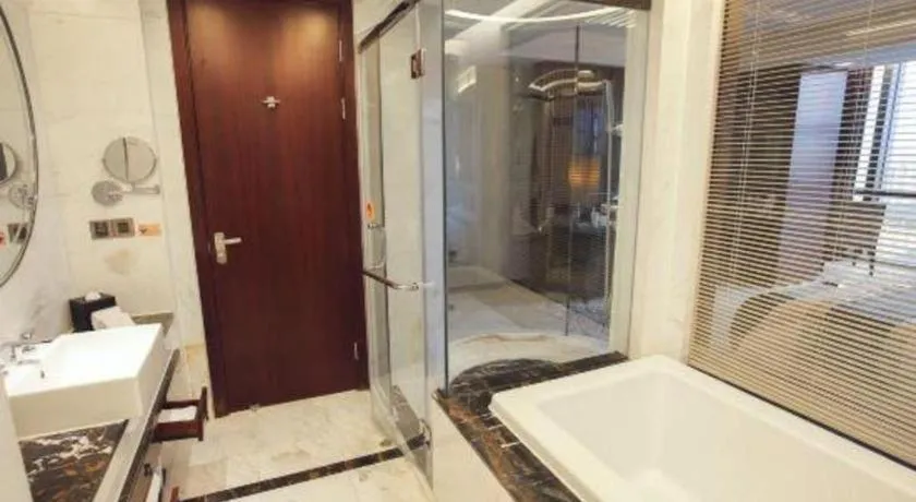 Bed in Zhangjiagang Zhonglian GDH International Hotel