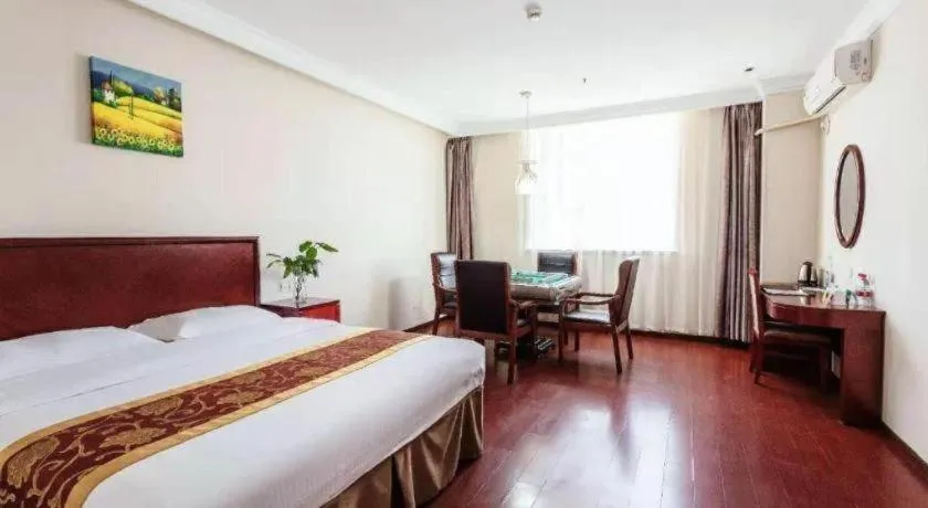 Bed in GreenTree Inn Shanghai Changxing Island Yuansha Fishing Port Hotel