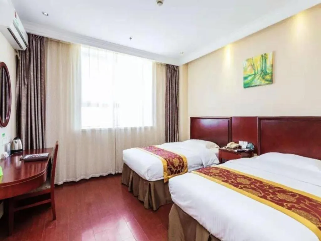 Bed in GreenTree Inn Shanghai Changxing Island Yuansha Fishing Port Hotel