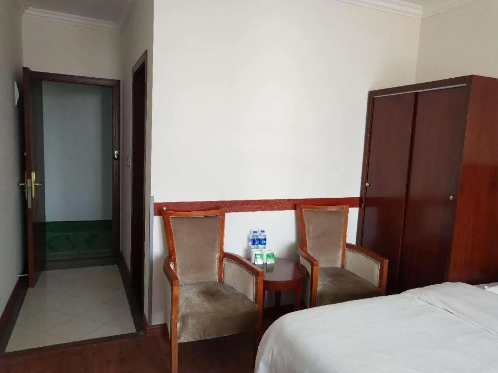 Bed in GreenTree Inn Shanghai Changxing Island Yuansha Fishing Port Hotel