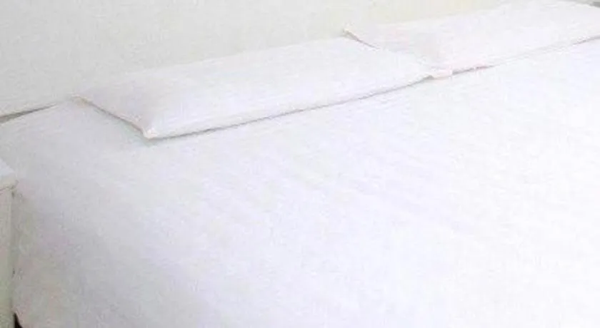 Bed in GreenTree Inn Shanghai Changxing Island Yuansha Fishing Port Hotel