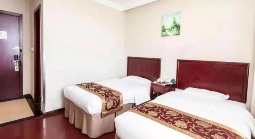 Bed in GreenTree Inn Shanghai Changxing Island Yuansha Fishing Port Hotel