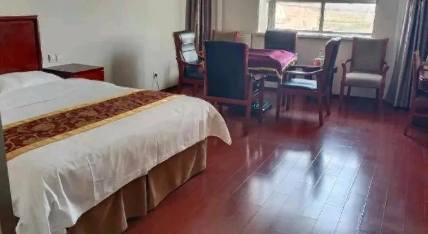 Bed in GreenTree Inn Shanghai Changxing Island Yuansha Fishing Port Hotel