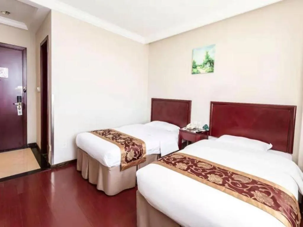 Bed in GreenTree Inn Shanghai Changxing Island Yuansha Fishing Port Hotel