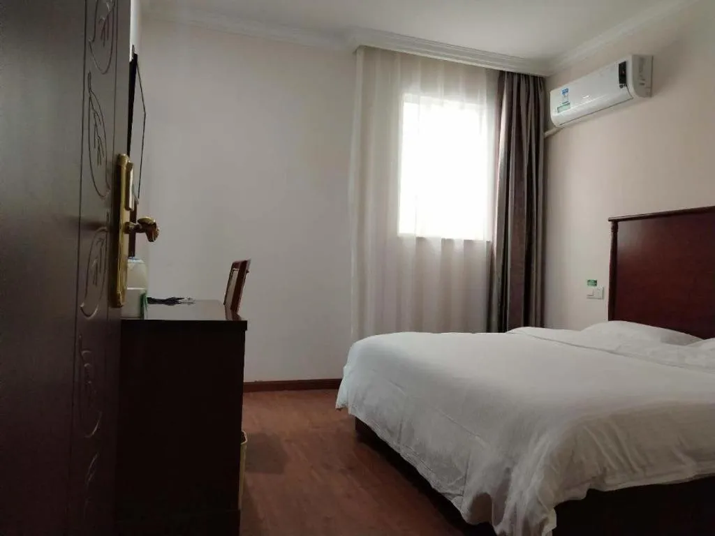 Bed in GreenTree Inn Shanghai Changxing Island Yuansha Fishing Port Hotel