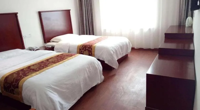 Bed in GreenTree Inn Shanghai Changxing Island Yuansha Fishing Port Hotel