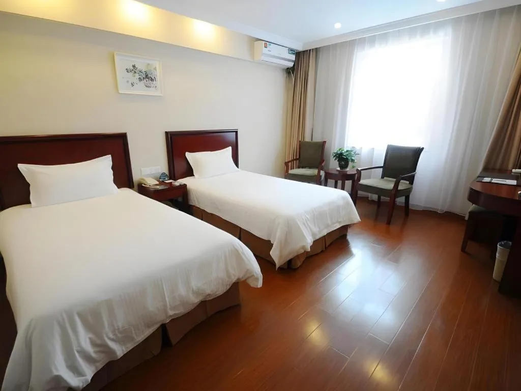 Bed in GreenTree Inn Shanghai Changxing Island Yuansha Fishing Port Hotel